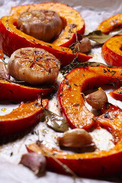 Homemade baked pumpkin with garlic and herbs