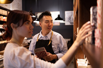 Choosing chocolates in a boutique