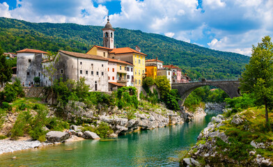 Panoramic view of slovenian village “Kanal ob Soči“ on a summer day. Picturesque scenery with...