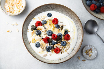 Granola with yogurt, fresh berries and coconut