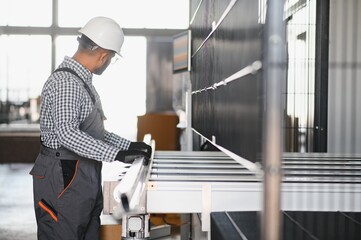PVC industry worker or operator making frames for windows and doors