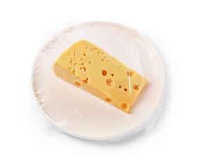 Plate of cheese with plastic food wrap isolated on white