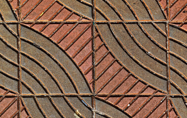 Red and black textured concrete blocks on floor in Ribeirao Preto, Sao Paulo, Brazil