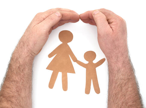 Male hands closing silhouettes of people.