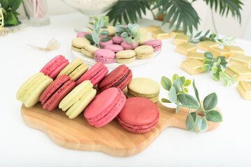 Group of green and red sweet macaroons. Closeup view