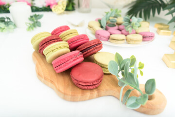 Group of green and red sweet macaroons. Closeup view
