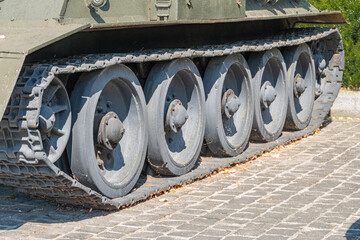 Military war tank. Part of the weapon in close up. Military khaki coloring. Metal weapons. Arms supplies for Ukraine. Ukrainian and Russian tanks, detail of weapons from the Russian-Ukrainian war.