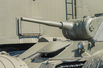 Military war tank. Part of the weapon in close up. Military khaki coloring. Metal weapons. Arms supplies for Ukraine. Ukrainian and Russian tanks, detail of weapons from the Russian-Ukrainian war.