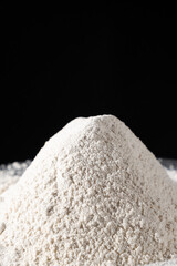 Texture of Natural Organic Whole Wheat Flour on Black Background.