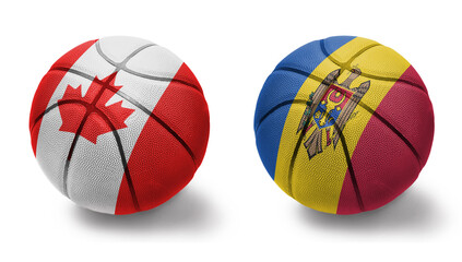 basketball balls with the national flags of moldova and canada on the white background.