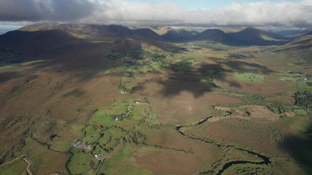 Spectacular 4K aerial footage of mountain valley from above with scenic mountains and countryside,  Maam west, Connemara, Galway, Ireland