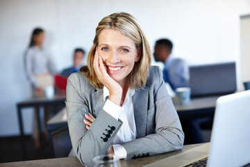 Mature woman, business and laptop in office for research, communication and networking clients. Employee, portrait and tech for project management, corporate development or sustainability integration
