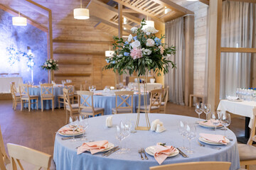 table decoration in a restaurant for a wedding banquet