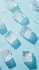 Obraz premium Ice cubes under water or on a light blue background