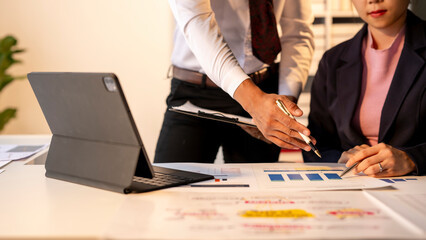 A man and a woman are working on a project together