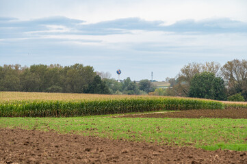 Colorful plowed agriculture fields at the Flemish countryside in Boutersem, Flemish Brabant, Belgium