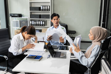 Businessman team working are under stress from financial data and report graph. Failed teamwork concept