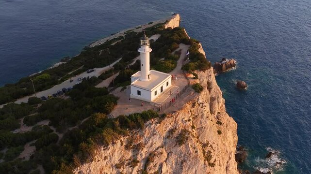 Panoramic aerial sunset view of the lighthouse at Cape Lefkatas on Lefkada island, Ionian Sea, Greece
