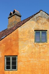 Old orange house of Nyboder district in Copenhagen, Denmark	