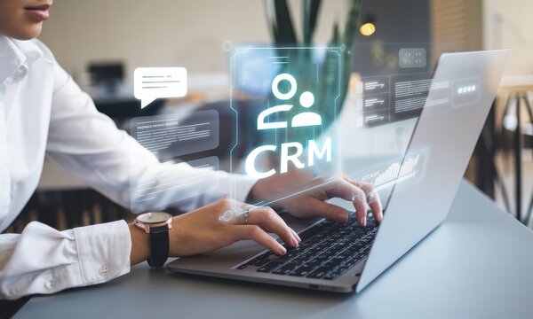 A Modern Office Setting Showcasing Innovative CRM Technology and Professional Collaboration