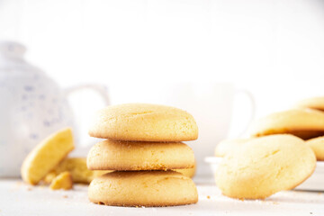 Homemade classic shortbread sugar cookies, traditional english tea party butter sweet shortbread sugar  biscuits, on white kitchen table