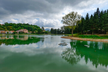 Fototapeta premium View of a dam of Sirino lakelake in the mountains of Basilicata, Italy.