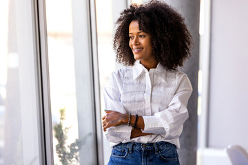 Confident Professional Woman Smiling in Modern Office Setting