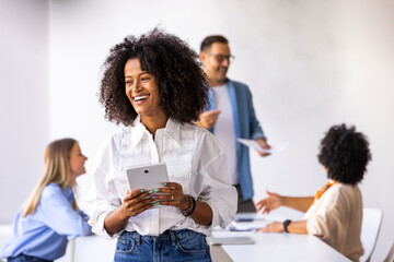 Confident Woman Leading Business Meeting in Modern Office Space