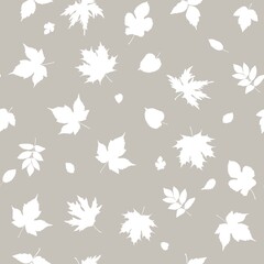 Fashion beige grey seamless pattern with white silhouettes of autumn leaves. The illustration creates a sense of simplicity and naturalness, ideal for creating backgrounds, textiles and wallpapers.