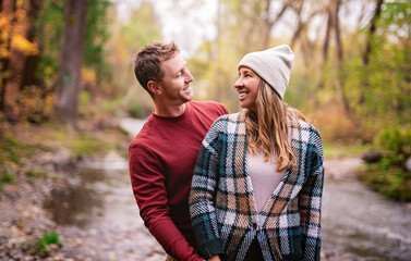 photo of harmony romantic couple in october autumn forest town park