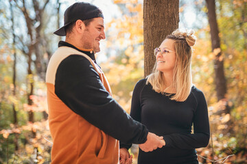 photo of harmony romantic couple in october autumn forest town park