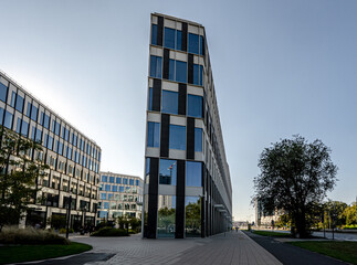 Modern Glass Building In European City Landscape Stands Tall And Majestic