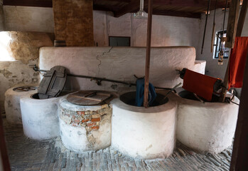 old antique barrels in which the wool was dyed