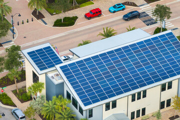 Photovoltaic panels on solar rooftop of Florida commercial building for producing clean ecological...