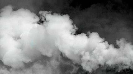 Fototapeta premium A black and white photo of smoke and steam. The image has a moody and mysterious feel to it