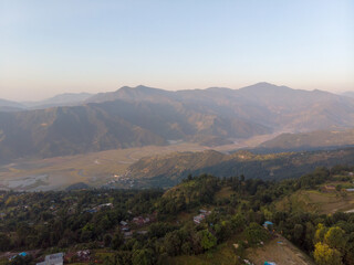 A breathtaking view of the mountains with lush green valleys below.