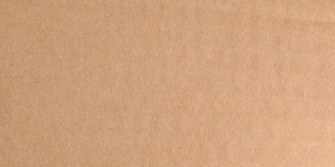 Blank light rough cartop paper macro close up view. Brown cardboard paper sheet texture background