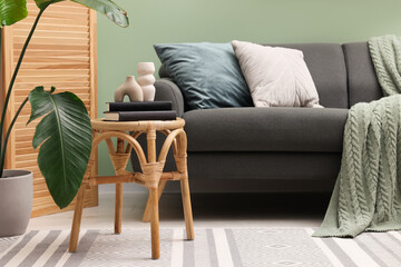 Living room with stool and sofa. Stylish interior design