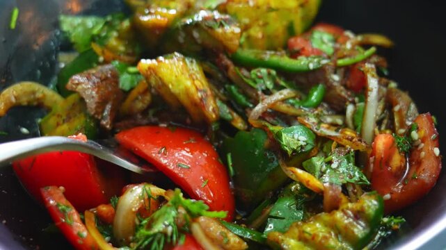 salad of ofaschi, pepper, greens. Garnished with sesame seeds and sauce