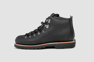 Black leather boots on white background. Fashion