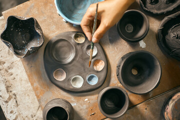 The process of creating pottery. 