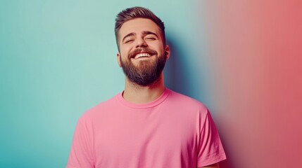 Bearded man in a pink t-shirt, smiling, standing against a gradient wall background, studio lighting, simple setting