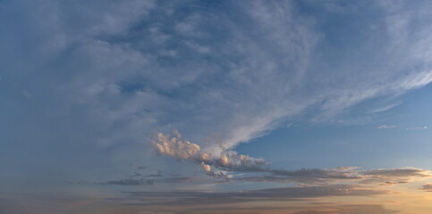 Russia. The South of Western Siberia. Panorama of the evening summer sky with multicolored clouds...