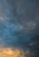Russia. The South of Western Siberia. Panorama of the evening summer sky with multicolored clouds over the fields of Kuznetsk Alatau.