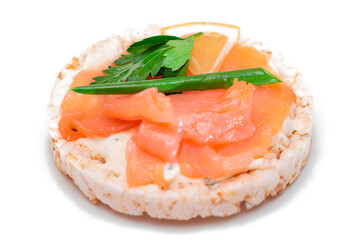Rice Cake Sandwich with Fresh Salmon, Lemon and Greens - Isolated on White Background. Diet Food. Quick and Healthy Sandwiches. Crispbread with Fresh Fillings. Healthy Dietary Snack