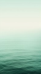 Fototapeta premium Tranquil Gradient: Soft Emerald Green to Light Jade for Nature-Inspired Serenity