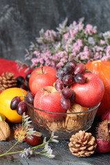 Still life photo with apples and grapes. Close up of seasonal vegetables and fruit. Balanced diet and healthy lifestyle concept. 