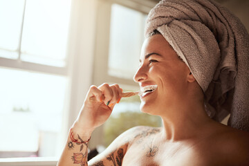 Woman, happy or brushing teeth in bathroom for oral care, dental hygiene or cleaning routine. Girl,...