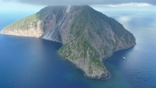 The scenic, volcanically active island of Komba lies 70 km north of the island of Lembata in the Lesser Sunda Islands. The reefs surrounding this remote island are rich in fish and corals.