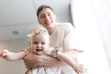 Joyful Father-Daughter Bonding Moment at Home